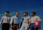 Image of tired men driving desert highway Las Vegas Nevada USA, 1967, second 17 stock footage video 65675079701