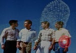 Image of tired men driving desert highway Las Vegas Nevada USA, 1967, second 19 stock footage video 65675079701