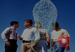 Image of tired men driving desert highway Las Vegas Nevada USA, 1967, second 20 stock footage video 65675079701