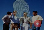 Image of tired men driving desert highway Las Vegas Nevada USA, 1967, second 21 stock footage video 65675079701