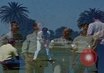 Image of tired men driving desert highway Las Vegas Nevada USA, 1967, second 25 stock footage video 65675079701