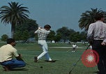 Image of tired men driving desert highway Las Vegas Nevada USA, 1967, second 27 stock footage video 65675079701