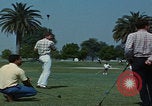 Image of tired men driving desert highway Las Vegas Nevada USA, 1967, second 28 stock footage video 65675079701