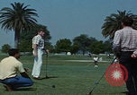 Image of tired men driving desert highway Las Vegas Nevada USA, 1967, second 30 stock footage video 65675079701