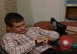 Image of tired men driving desert highway Las Vegas Nevada USA, 1967, second 33 stock footage video 65675079701