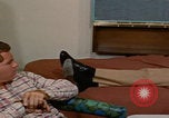 Image of tired men driving desert highway Las Vegas Nevada USA, 1967, second 38 stock footage video 65675079701