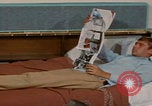 Image of tired men driving desert highway Las Vegas Nevada USA, 1967, second 41 stock footage video 65675079701