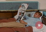 Image of tired men driving desert highway Las Vegas Nevada USA, 1967, second 42 stock footage video 65675079701