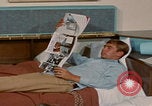 Image of tired men driving desert highway Las Vegas Nevada USA, 1967, second 43 stock footage video 65675079701