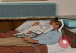 Image of tired men driving desert highway Las Vegas Nevada USA, 1967, second 44 stock footage video 65675079701