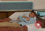 Image of tired men driving desert highway Las Vegas Nevada USA, 1967, second 46 stock footage video 65675079701