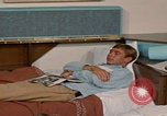 Image of tired men driving desert highway Las Vegas Nevada USA, 1967, second 48 stock footage video 65675079701