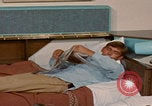 Image of tired men driving desert highway Las Vegas Nevada USA, 1967, second 52 stock footage video 65675079701