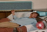 Image of tired men driving desert highway Las Vegas Nevada USA, 1967, second 53 stock footage video 65675079701