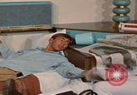 Image of tired men driving desert highway Las Vegas Nevada USA, 1967, second 54 stock footage video 65675079701