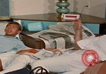 Image of tired men driving desert highway Las Vegas Nevada USA, 1967, second 55 stock footage video 65675079701