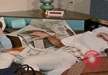Image of tired men driving desert highway Las Vegas Nevada USA, 1967, second 56 stock footage video 65675079701
