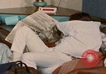 Image of tired men driving desert highway Las Vegas Nevada USA, 1967, second 58 stock footage video 65675079701