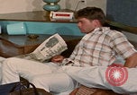 Image of tired men driving desert highway Las Vegas Nevada USA, 1967, second 59 stock footage video 65675079701