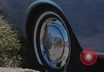Image of flat tire desert driving United States USA, 1967, second 1 stock footage video 65675079702