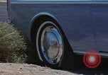 Image of flat tire desert driving United States USA, 1967, second 3 stock footage video 65675079702