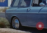 Image of flat tire desert driving United States USA, 1967, second 4 stock footage video 65675079702