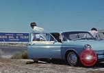 Image of flat tire desert driving United States USA, 1967, second 8 stock footage video 65675079702