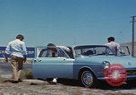 Image of flat tire desert driving United States USA, 1967, second 10 stock footage video 65675079702