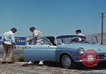Image of flat tire desert driving United States USA, 1967, second 11 stock footage video 65675079702