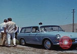 Image of flat tire desert driving United States USA, 1967, second 15 stock footage video 65675079702