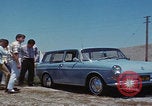 Image of flat tire desert driving United States USA, 1967, second 20 stock footage video 65675079702