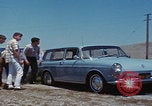 Image of flat tire desert driving United States USA, 1967, second 28 stock footage video 65675079702