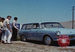 Image of flat tire desert driving United States USA, 1967, second 31 stock footage video 65675079702
