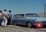 Image of flat tire desert driving United States USA, 1967, second 33 stock footage video 65675079702