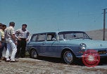 Image of flat tire desert driving United States USA, 1967, second 34 stock footage video 65675079702