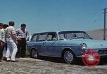 Image of flat tire desert driving United States USA, 1967, second 35 stock footage video 65675079702
