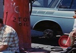 Image of flat tire desert driving United States USA, 1967, second 39 stock footage video 65675079702