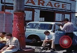 Image of flat tire desert driving United States USA, 1967, second 42 stock footage video 65675079702