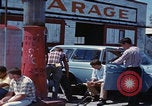 Image of flat tire desert driving United States USA, 1967, second 49 stock footage video 65675079702