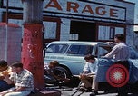 Image of flat tire desert driving United States USA, 1967, second 52 stock footage video 65675079702