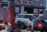 Image of flat tire desert driving United States USA, 1967, second 53 stock footage video 65675079702