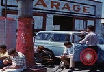 Image of flat tire desert driving United States USA, 1967, second 54 stock footage video 65675079702