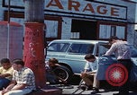 Image of flat tire desert driving United States USA, 1967, second 57 stock footage video 65675079702