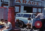 Image of flat tire desert driving United States USA, 1967, second 58 stock footage video 65675079702