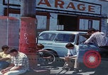 Image of flat tire desert driving United States USA, 1967, second 59 stock footage video 65675079702
