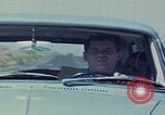 Image of flat tire desert driving United States USA, 1967, second 61 stock footage video 65675079702