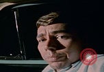 Image of night drowsy driving  United States USA, 1967, second 17 stock footage video 65675079703