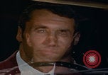 Image of man falling asleep driving San Bernardino California USA, 1967, second 1 stock footage video 65675079704