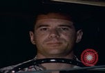 Image of man falling asleep driving San Bernardino California USA, 1967, second 4 stock footage video 65675079704