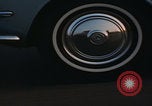 Image of man falling asleep driving San Bernardino California USA, 1967, second 7 stock footage video 65675079704